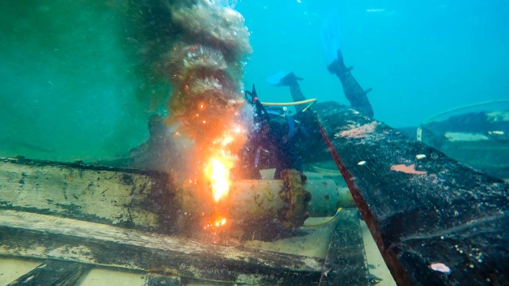 Commercial Diver Underwater Cutting